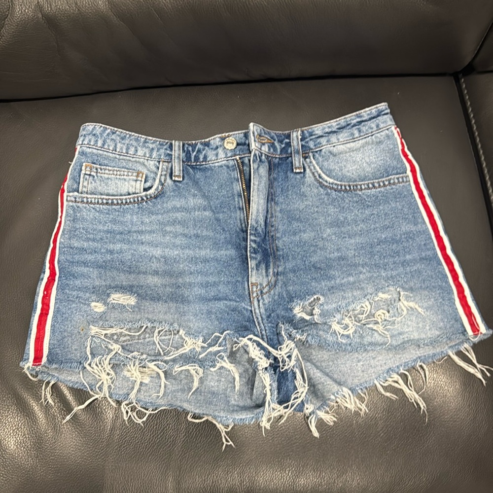 Blue jean shorts with red stripe